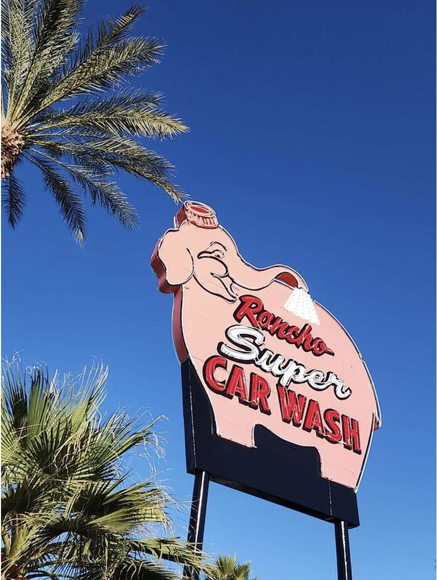 YESCO REFURBISHES HISTORIC RANCHO SUPER CAR WASH PINK ELEPHANT SIGN IN RANCHO MIRAGE, CALIFORNIA