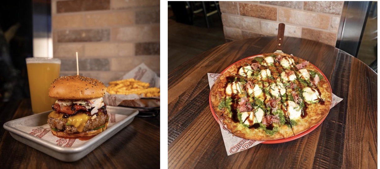 Burger And Pizza Dining At Local Restaurant Burger And Pizza Dining At Local Restaurant