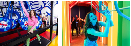 Guest Playing Interactive Arcade Game and Exploring Neon Interactive Experience Guest Playing Interactive Arcade Game and Exploring Neon Interactive Experience